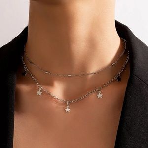 Silver layered star necklace